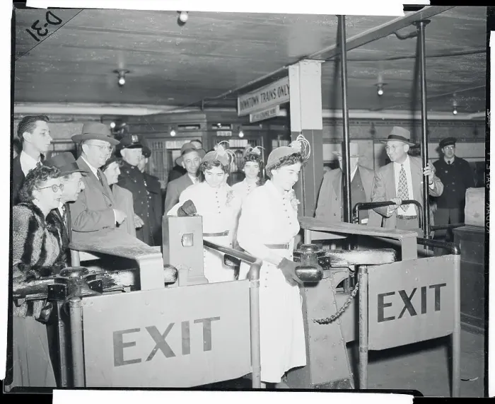 Framed Print : Dionne Quintuplets Entering Subway Station Framed Print : Dionne Quintuplets Entering Subway Station