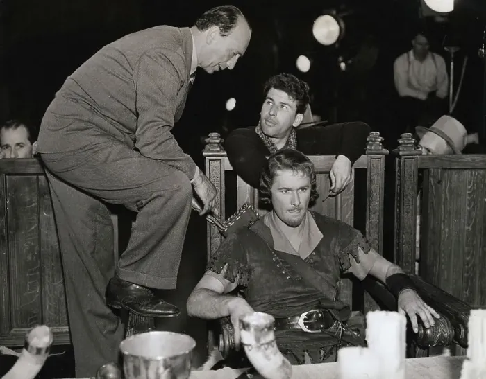Framed Print : Director Preparing Actor Errol Flynn for Movie Scene Framed Print : Director Preparing Actor Errol Flynn for Movie Scene