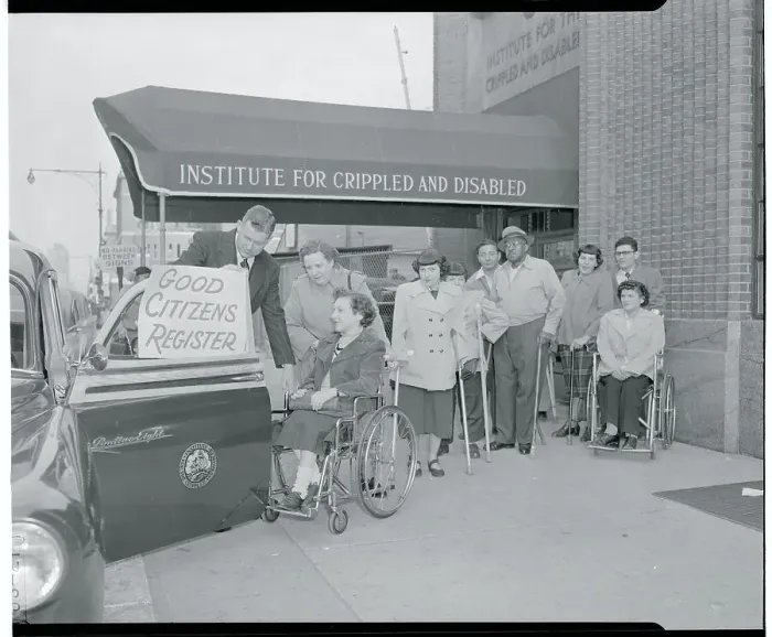 Framed Print : Disabled Patient Helped Into Car Framed Print : Disabled Patient Helped Into Car