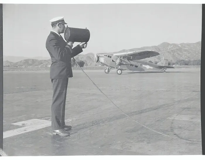 Framed Print : Dispatcher Shooting Electric Beam for Airplanes Framed Print : Dispatcher Shooting Electric Beam for Airplanes