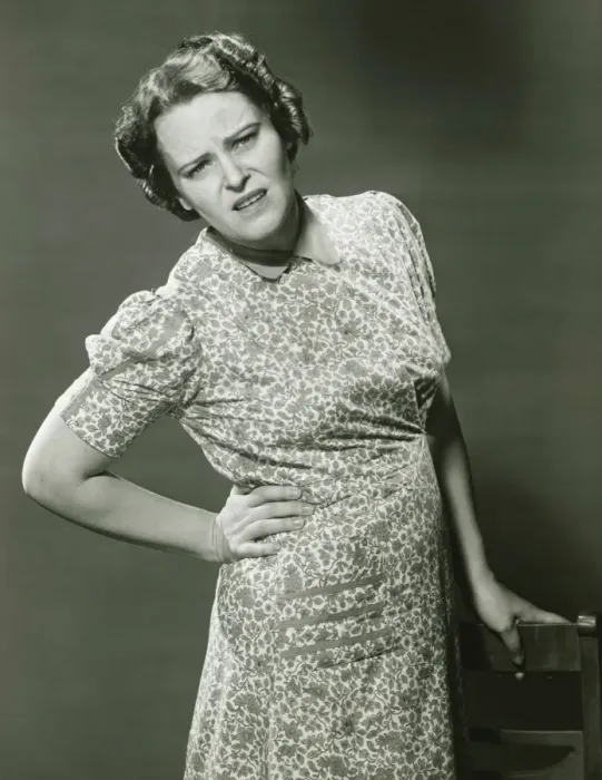Framed Print : Displeased woman posing in studio, (B&W), portrait Framed Print : Displeased woman posing in studio, (B&W), portrait