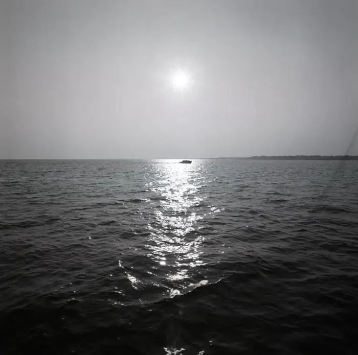 Framed Print : Distant boat on ocean Framed Print : Distant boat on ocean