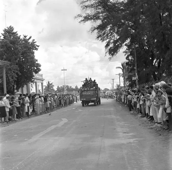 Framed Print : Distant View of Fidel Castro Riding on Truck with Soldiers Framed Print : Distant View of Fidel Castro Riding on Truck with Soldiers