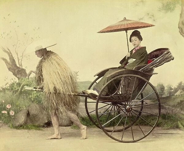 A distinguished woman with a parasol being pulled in a jinrikisha by a man wearing a straw mackintosh, Rischka, c. 1870, Japan, Historic, digitally restored reproduction from an original of the period
