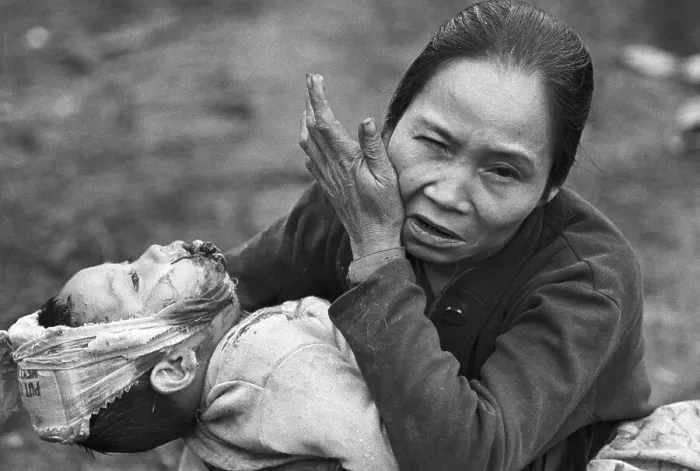 Framed Print : Distraught Vietnamese Woman Holding Child Framed Print : Distraught Vietnamese Woman Holding Child