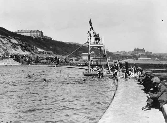 Framed Print : Divers. circa 1917: The diving board at the bathing pool at the South Cliff Framed Print : Divers. circa 1917: The diving board at the bathing pool at the South Cliff