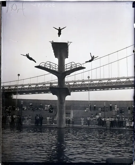 Framed Print : Divers Dive Off High Board Framed Print : Divers Dive Off High Board