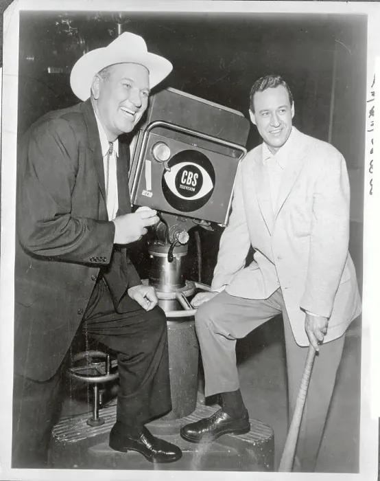 : Dizzy Dean and Buddy Blattner Posing with Videocamera : Dizzy Dean and Buddy Blattner Posing with Videocamera