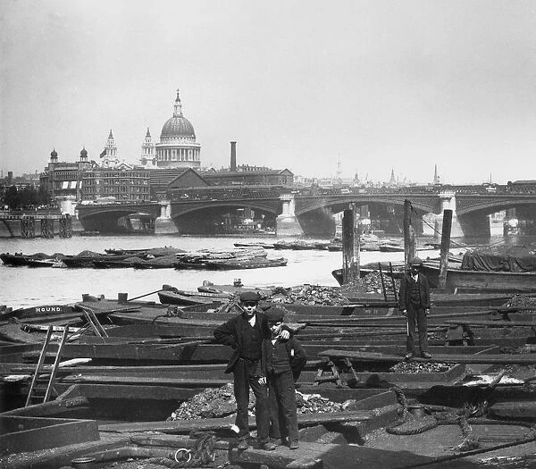 Dock Boys. circa 1865: A view across the River Thames towards Blackfriars Bridge