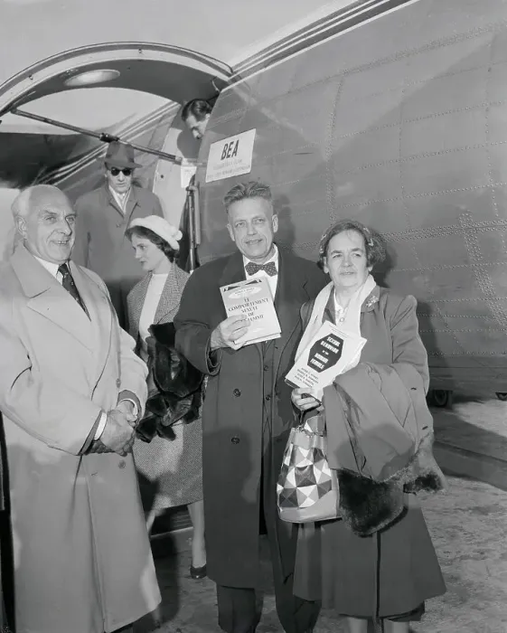 Framed Print : Doctor Alfred Kinsey and his wife Holding up Book
