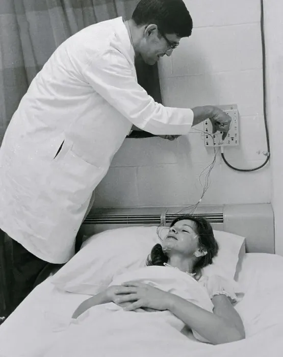 Framed Print : Doctor Attending to Patient Framed Print : Doctor Attending to Patient
