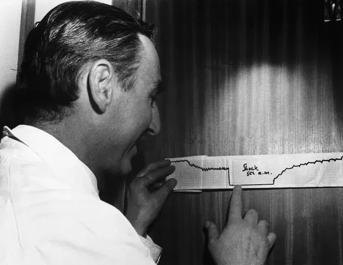 Framed Print : Doctor Cecil Moss Pointing at Electrocardiograph