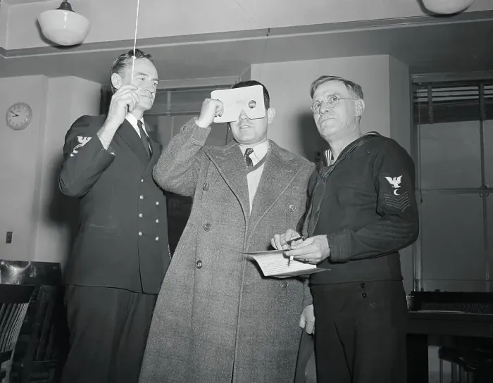 Framed Print : Doctor Checking The Eyesight of a New Prospective Recruit Framed Print : Doctor Checking The Eyesight of a New Prospective Recruit