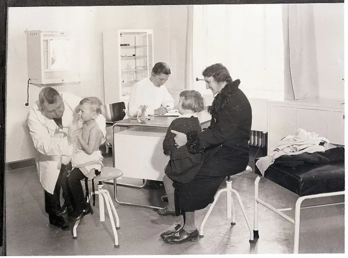 Framed Print : Doctor Examining Children for Tuberculosis Framed Print : Doctor Examining Children for Tuberculosis