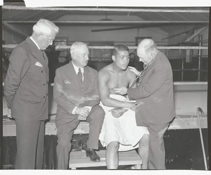Framed Print : Doctor Examining Joe Louis Framed Print : Doctor Examining Joe Louis