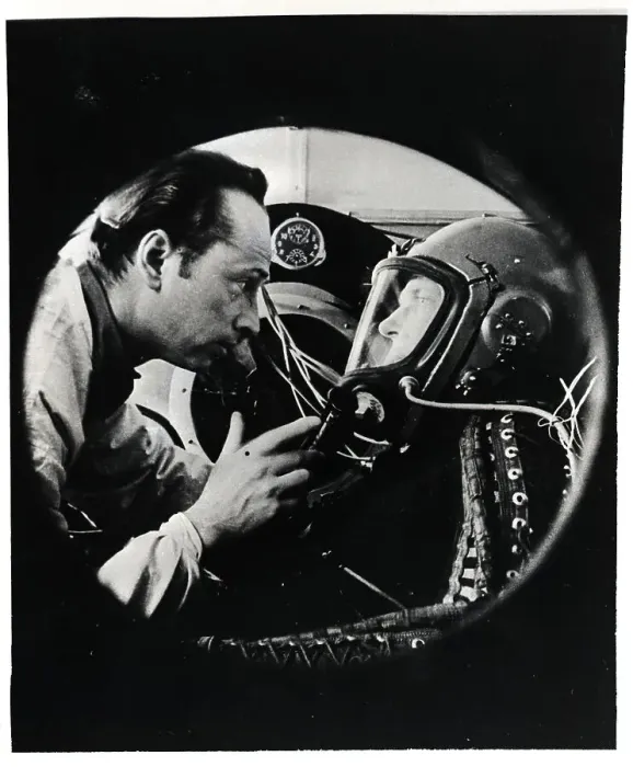 Framed Print : Doctor Instructs Cosmonaut in Mask Framed Print : Doctor Instructs Cosmonaut in Mask