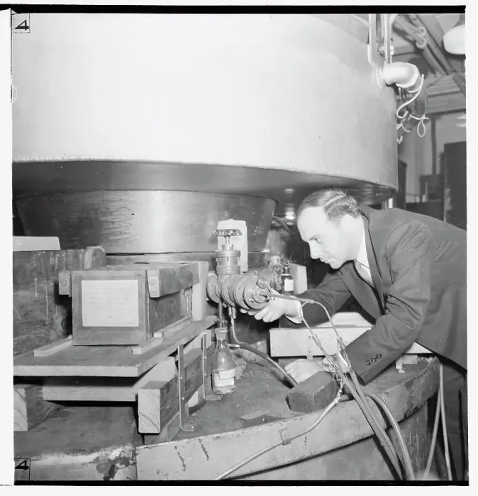Framed Print : Doctor John Dunning Working with Mechanism Framed Print : Doctor John Dunning Working with Mechanism