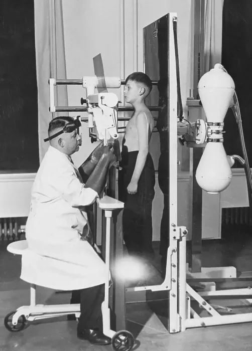 Framed Print : Doctor Taking X-Ray of Boy Framed Print : Doctor Taking X-Ray of Boy