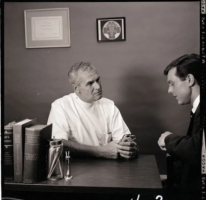 Framed Print : Doctor Talking with Patient Framed Print : Doctor Talking with Patient