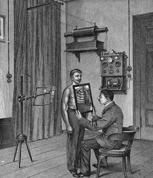 Framed Print : Doctor Using Early X Ray Device Framed Print : Doctor Using Early X Ray Device