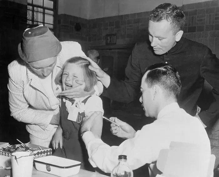 Framed Print : Doctor Vaccinating a Child Framed Print : Doctor Vaccinating a Child