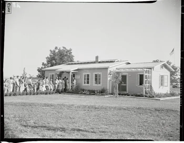 Framed Print : Doctors and Patients in Front of Migrant Clinic Framed Print : Doctors and Patients in Front of Migrant Clinic