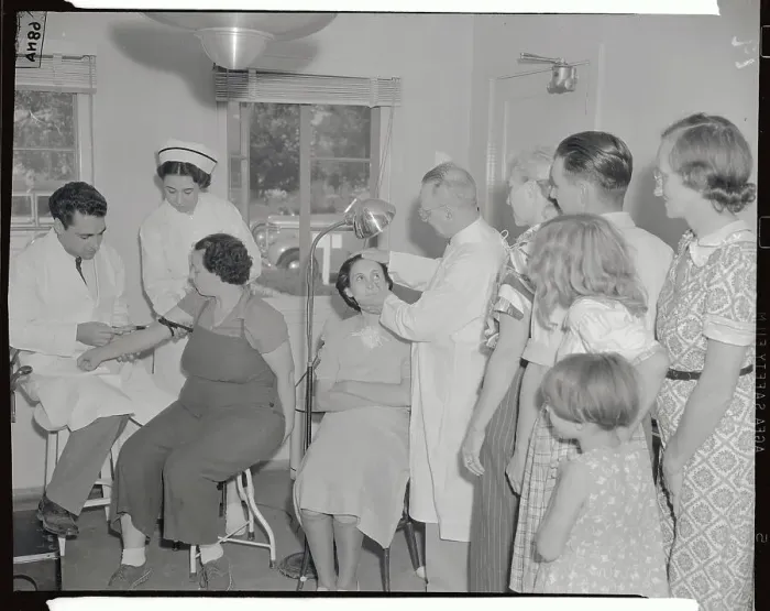 Framed Print : Doctors Treating Women at Migratory Camp Framed Print : Doctors Treating Women at Migratory Camp