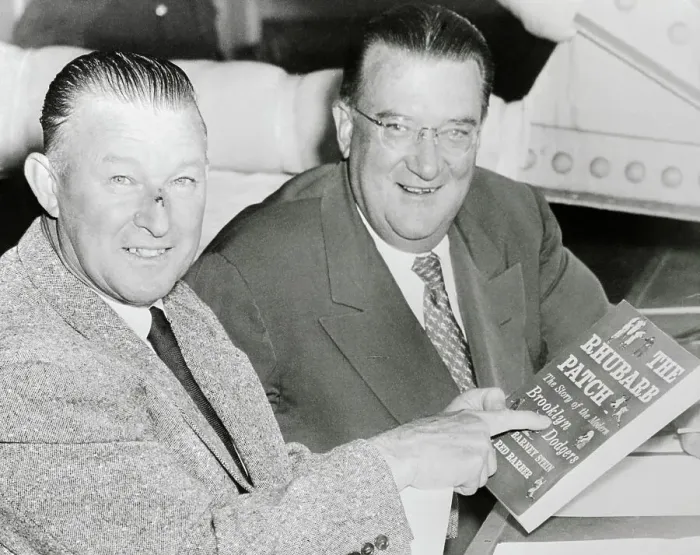 Framed Print : Dodger Officials Reading Book About Team of the Same Name Framed Print : Dodger Officials Reading Book About Team of the Same Name