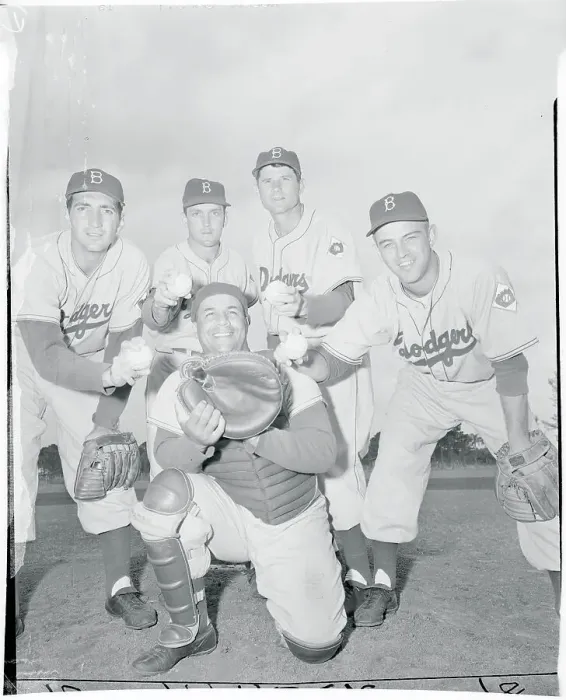 Framed Print : Dodgers Pitchers Surrounding Roy Campanella