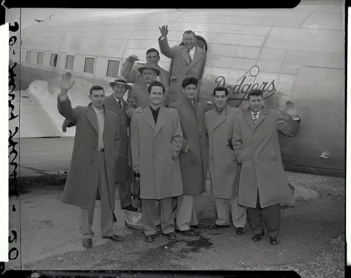 Framed Print : Dodgers Team Posing by Airplane
