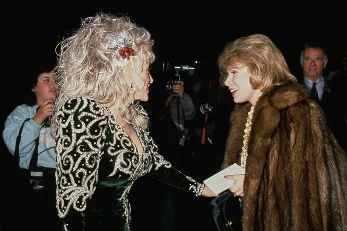 Framed Print : Dolly Parton And Joan Rivers Attend Sandy Gallin's Christmas Party Framed Print : Dolly Parton And Joan Rivers Attend Sandy Gallin's Christmas Party
