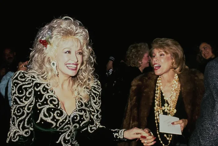 Framed Print : Dolly Parton And Joan Rivers Attend Sandy Gallin's Christmas Party Framed Print : Dolly Parton And Joan Rivers Attend Sandy Gallin's Christmas Party