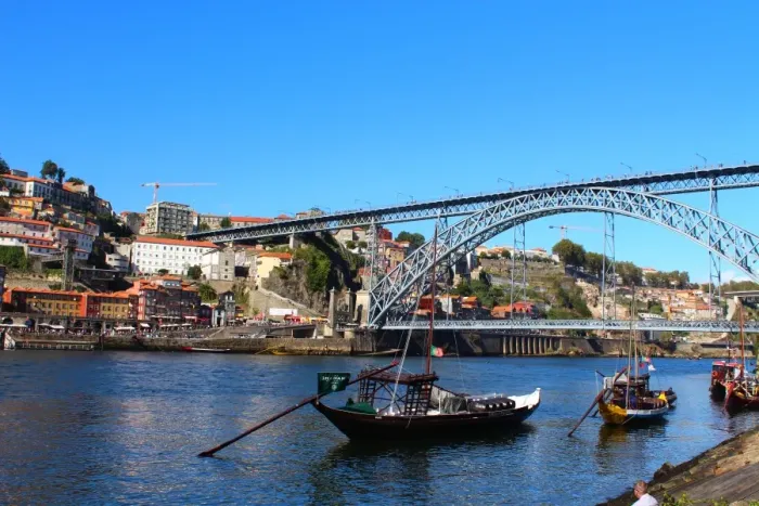 Framed Print : Dom LuAis I Bridge and a Rabelo boat in Porto Framed Print : Dom LuAis I Bridge and a Rabelo boat in Porto