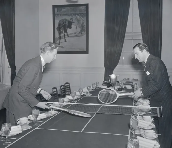 Framed Print : Don Budge and Fred Perry Playing Tennis on Dining Table Framed Print : Don Budge and Fred Perry Playing Tennis on Dining Table