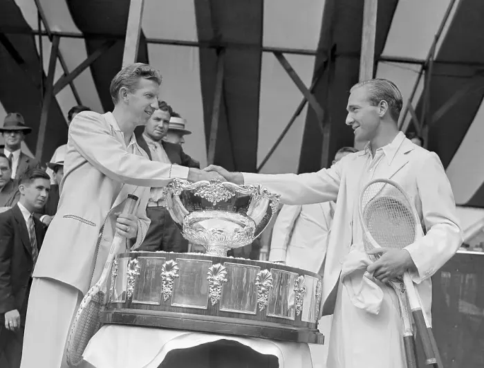 Framed Print : Don Budge and Jack Bromwich Shaking Hands over Davis Cup Framed Print : Don Budge and Jack Bromwich Shaking Hands over Davis Cup
