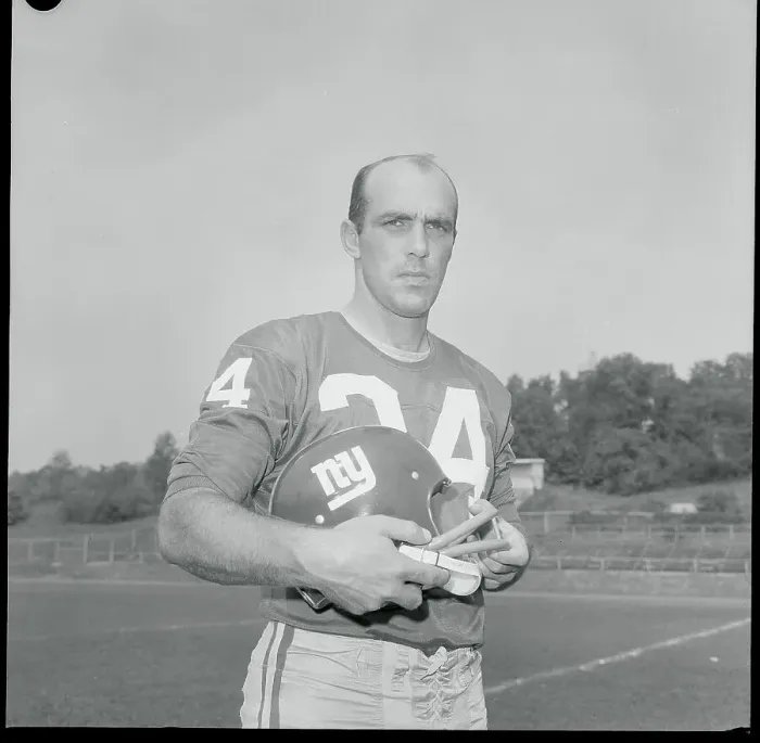 Framed Print : Don Chandler Pausing on Field Framed Print : Don Chandler Pausing on Field