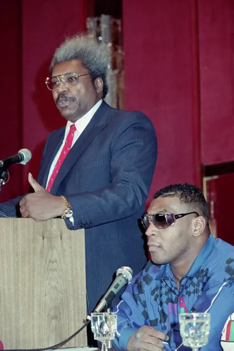 Framed Print : Don King Addresses Press, Mike Tyson Seated Framed Print : Don King Addresses Press, Mike Tyson Seated