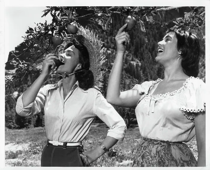 Framed Print : Donna Reed bites And Roberta Haynes In Gun Fury Framed Print : Donna Reed bites And Roberta Haynes In Gun Fury