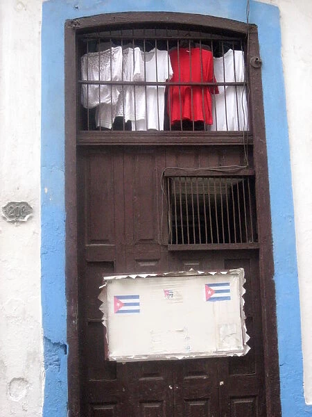 Doorway with laundry, Havana, Cuba