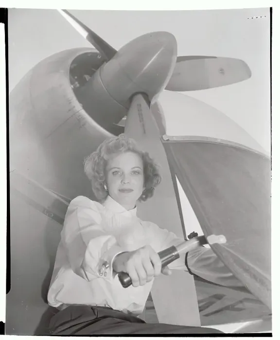 Framed Print : Doris Berger Posing by Plane Propeller Framed Print : Doris Berger Posing by Plane Propeller