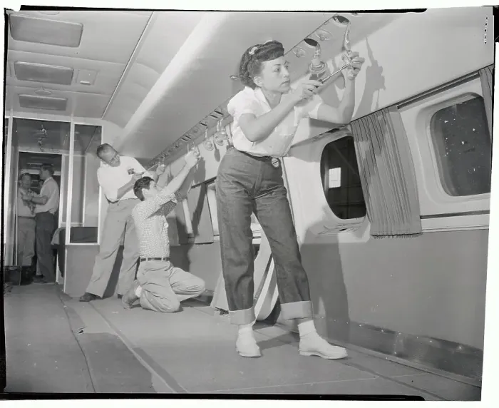 Framed Print : Dorothy Moreno Working on Interior of Plane Framed Print : Dorothy Moreno Working on Interior of Plane