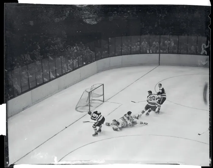 Framed Print : Doug Mohns Making a Shot on the Goal