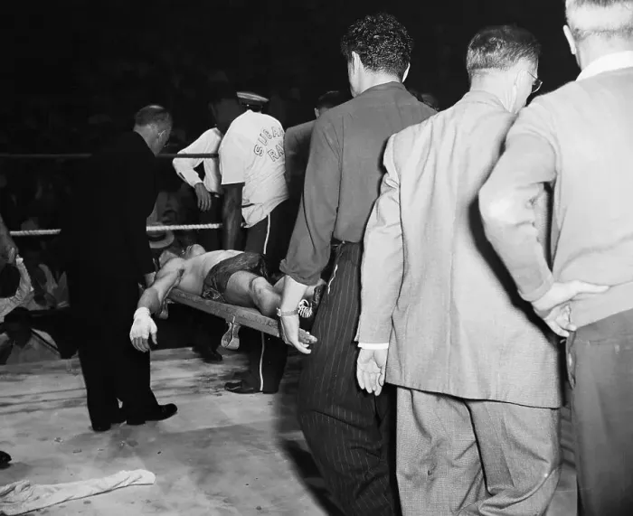 Framed Print : Doyle Carried on Stretcher After Fight