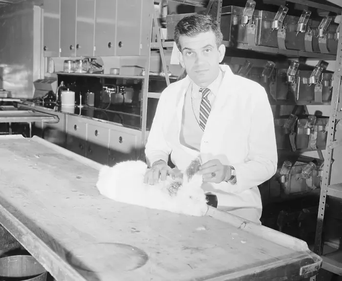 Framed Print : Dr. Ernest L. Wynder with a Rabbit Framed Print : Dr. Ernest L. Wynder with a Rabbit