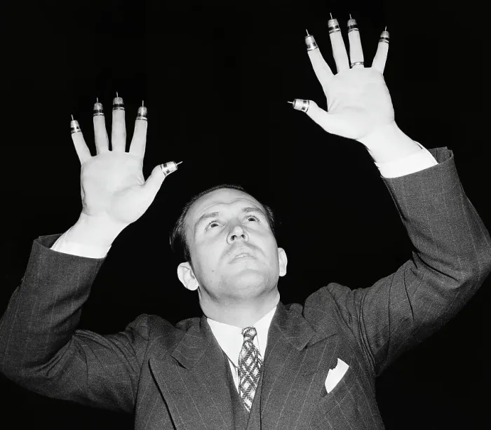 Framed Print : Dr. Irwin Moon with Thimbles on his Fingers