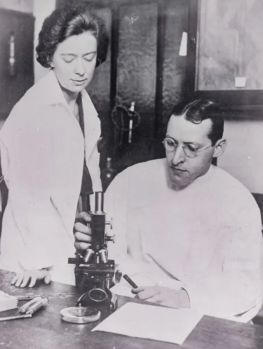 Framed Print : Dr. Isidore and His wife Working in Lab