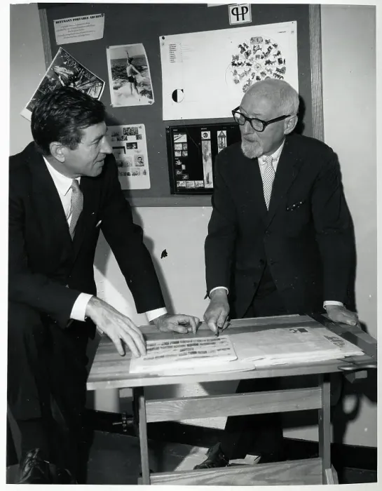 Framed Print : Dr. Otto Bettmann Discussing Pictures Framed Print : Dr. Otto Bettmann Discussing Pictures