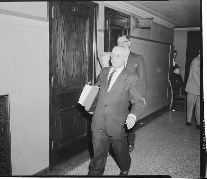 Framed Print : Dr. S. R. Gerber Hurring Into the Courtroom at the Sam Sheppard Case Framed Print : Dr. S. R. Gerber Hurring Into the Courtroom at the Sam Sheppard Case