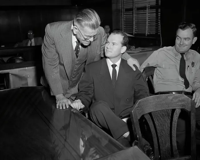 Framed Print : Dr. Samuel Sheppard Smiles at His Father During Trial