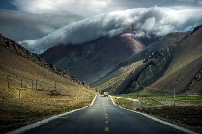 Framed Print : Dramatic cloud over mountain in TIbet